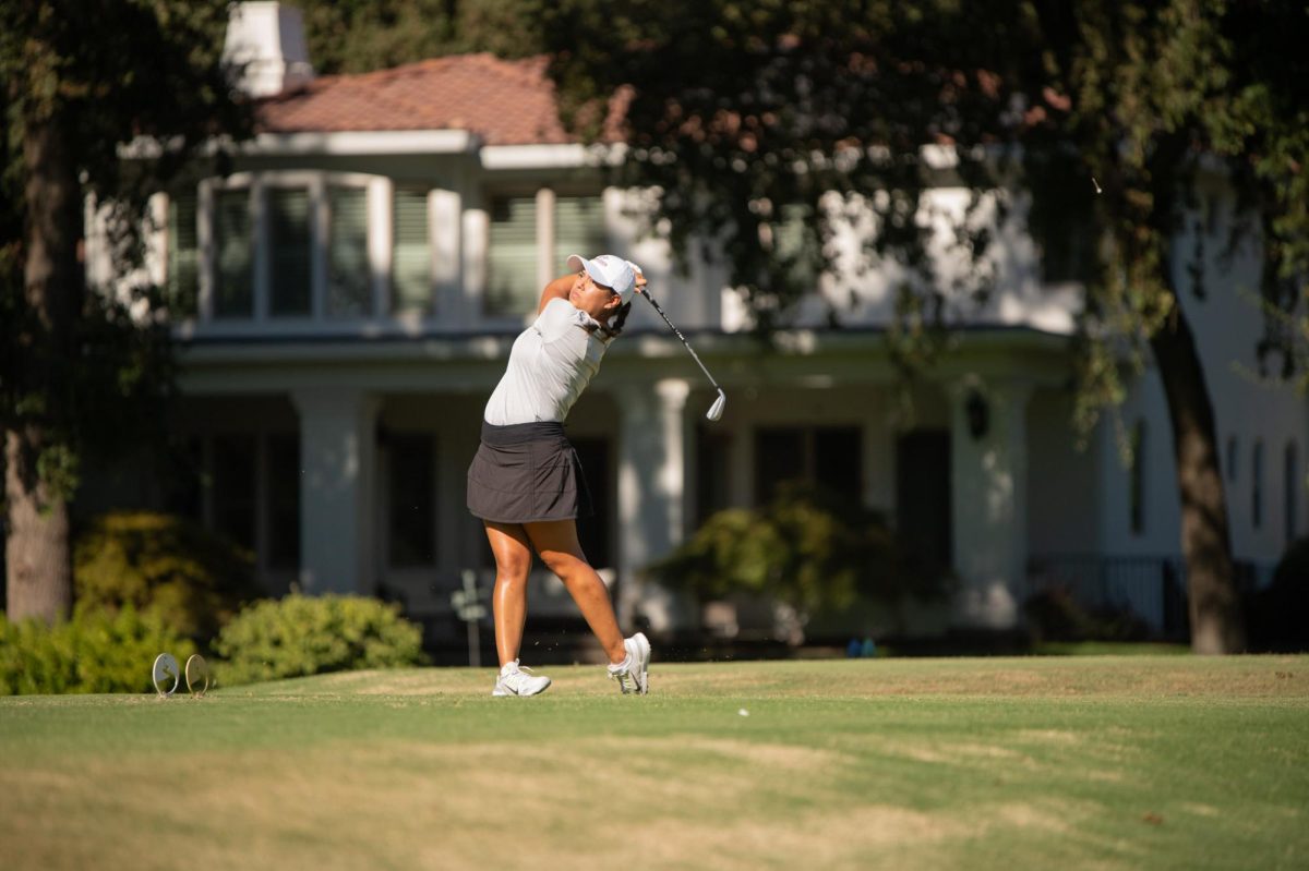 Chico State Wildcats’ senior Trinity Hernandez tees off during a practice round at Butte Creek Country Club. Photo taken by Cayden Jones.