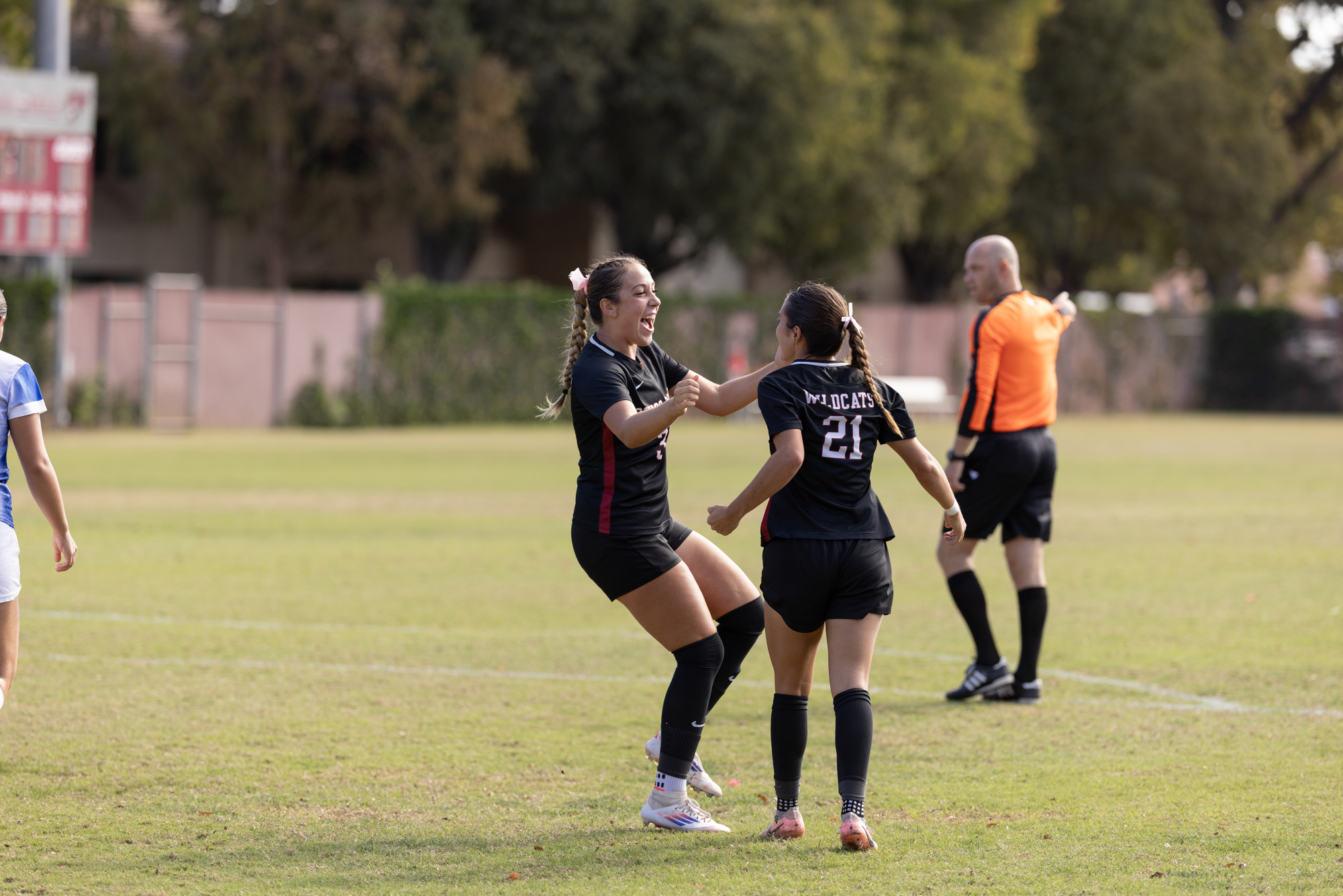 Senior forward Avery Pieri celebrating her first goal of the game alongside sophomore defender Madeline Mariani against the Cal State San Bernardino Coyotes. Pieri’s goal came in the 29th minute, giving Chico a 1-0 lead over the Coyotes. Photo taken by Aaron Draper on Oct. 27.