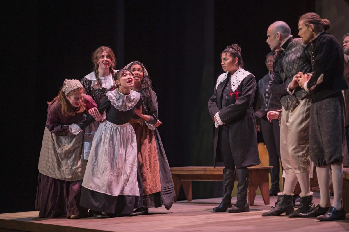 The cast is made up of almost 30 actors including Emma Lam as Abigail Williams. Photo taken Oct. 9 by Jason A. Hailey. 