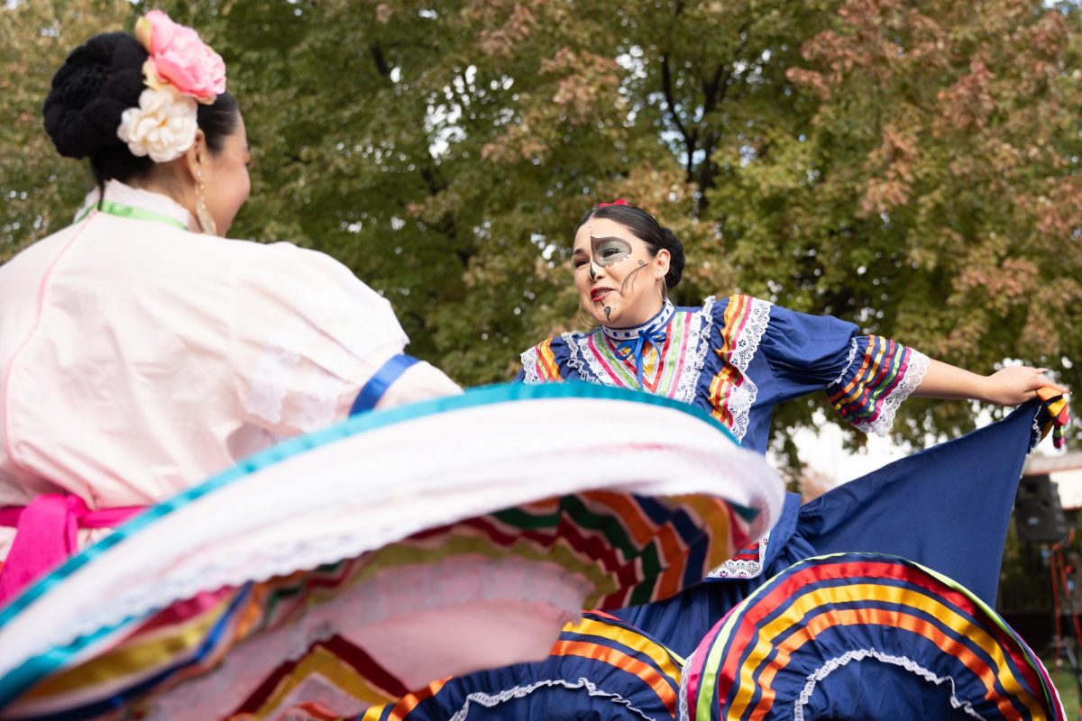 Nadia Ruedas Rosales performs a traditional Folklorico dance from Jalisco with dance peer Cynthia Fletes. Dancing has been a part of Rosales’ life since she was five years old. Initially inspired to dance by her aunt and instructor Francis Miranda, now at 19 years old and member of Ballet Folklorico de Chico, she is grateful for all the joy dancing has brought her. Performing at the cemetery was crucial for her as she said it was a way to honor her loved ones.