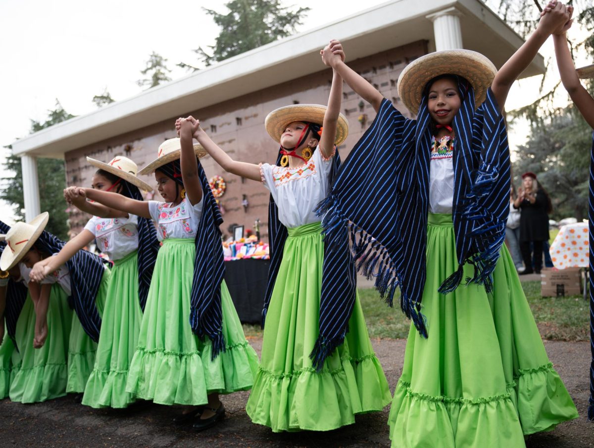 Grupo de Danza Patria Insurgente completed their first performance with a dance representing the region of Michoacán Saturday, Nov. 2, 2024 at the Chico Cemetery.