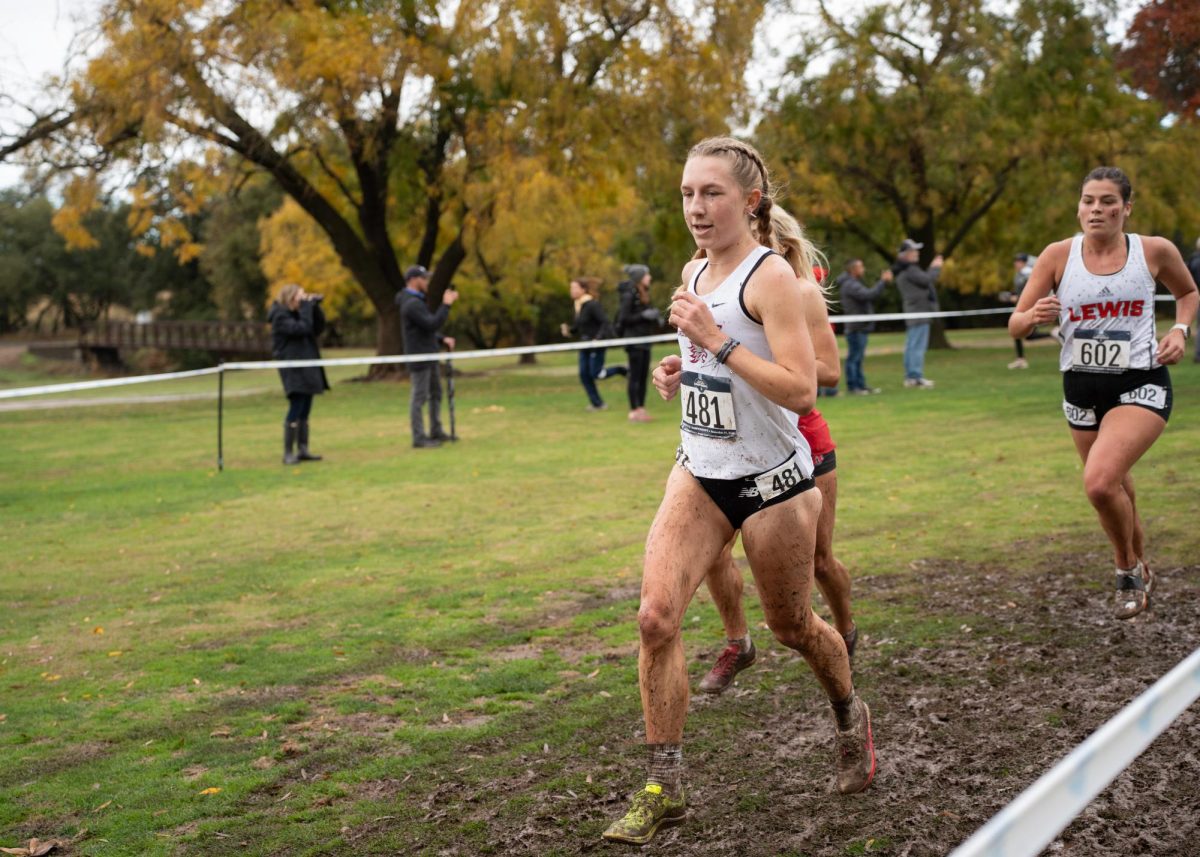 After rainy conditions, freshman Kaya Scuba navigates a 6k race course full of puddles and mud at the NCAA Division II Championship Saturday, Nov. 24, 2024.