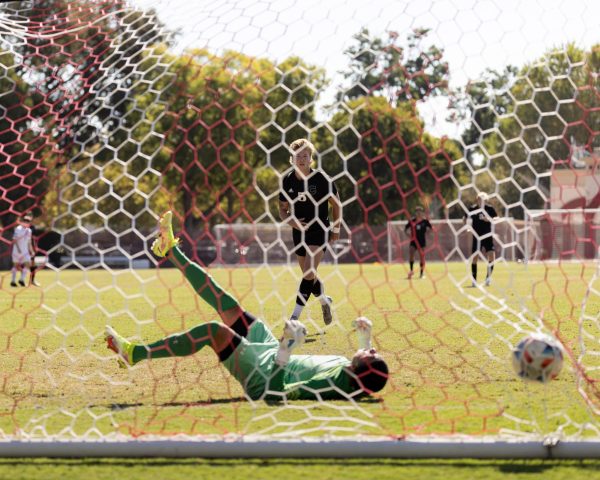 Senior forward Miles Rice sneaking one past the Toros keeper to score one of his two goals of the game from the penalty spot against the Cal State Dominguez Hills Toros. Photo taken by Aaron Draper on Oct. 6. 