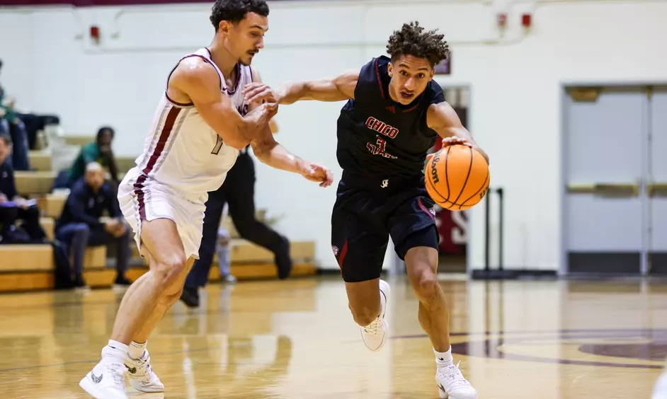 Miles Daniels driving to the cup against Seattle Pacific. Photo taken Nov. 8 by Rio Giancarlo/SPU. 