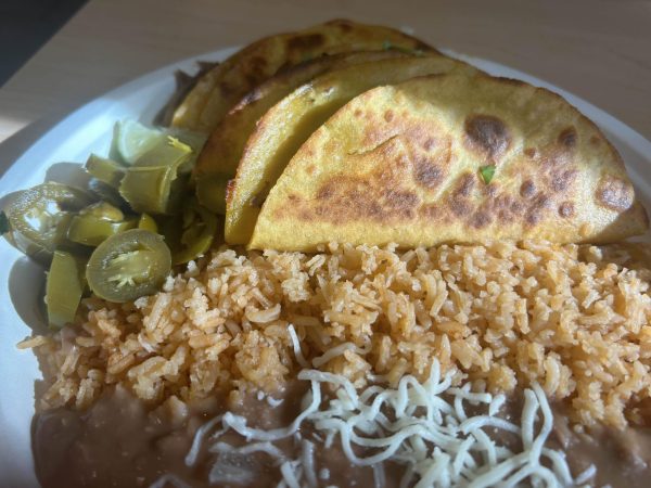 A plate of four delicious street tacos and a cup of horchata. Photo taken by Dominic Curcuro on Oct. 26. 
