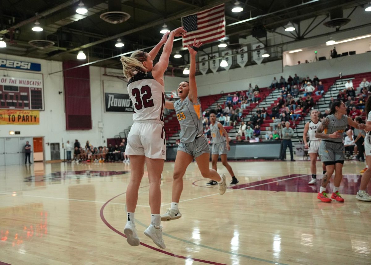 Cal State Los Angeles’ Olivia Hodges attempts to block senior forward Makenzi Laporte’s three-pointer attempt during the third quarter Saturday, Jan. 25, 2025.