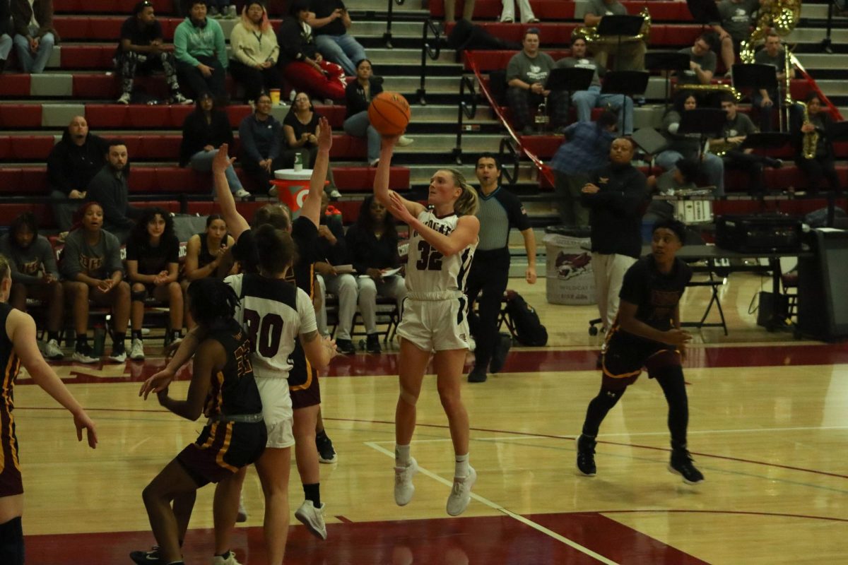 Senior forward Makenzi Laprorte attempts a right-handed shot in a game against Dominguez Hills on Jan. 24. 