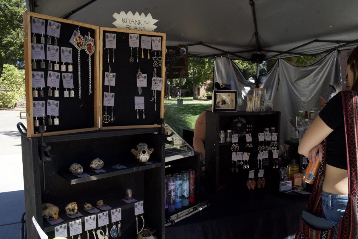 A local jewelry maker sells earrings and necklaces made of repurposed animal bones. Photo taken on Sept. 22. 