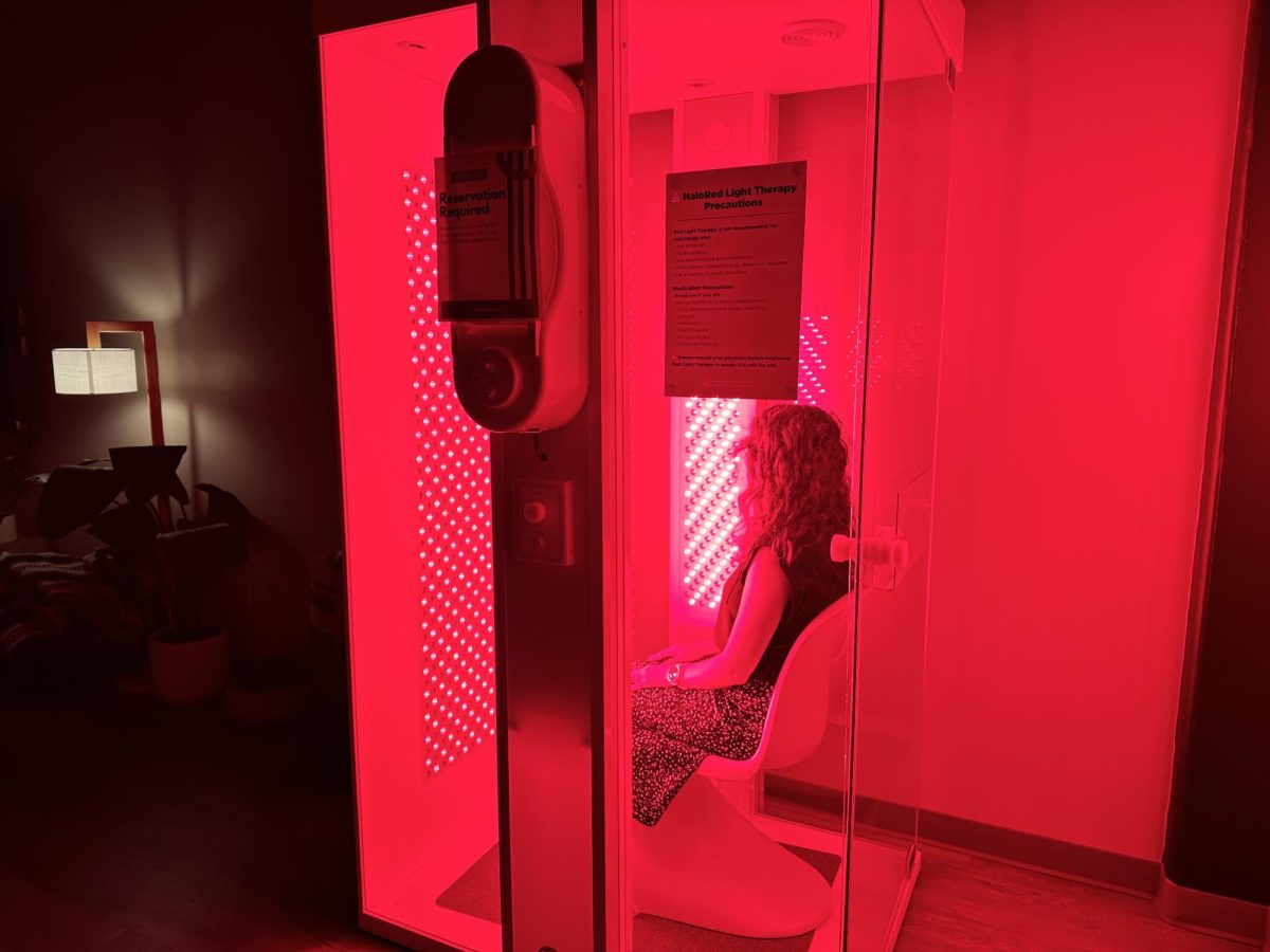 Christina Hammans Directo of The Well enjoys the HaloTherapy Pod.
