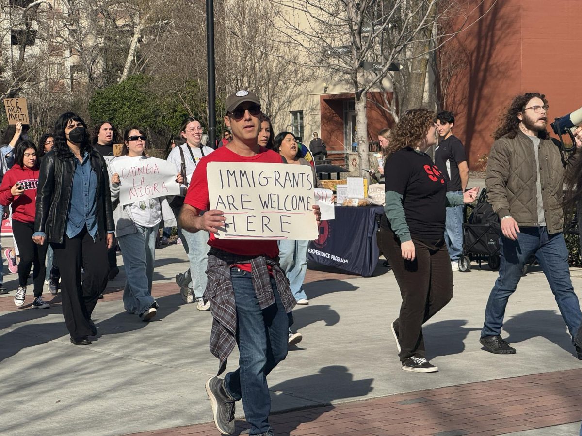 Eran Zelnik, a lecturer in the History Department, marching during the "ICE out for Good" protests. Photo taken by Aiden Masson on Jan. 30, 2026.