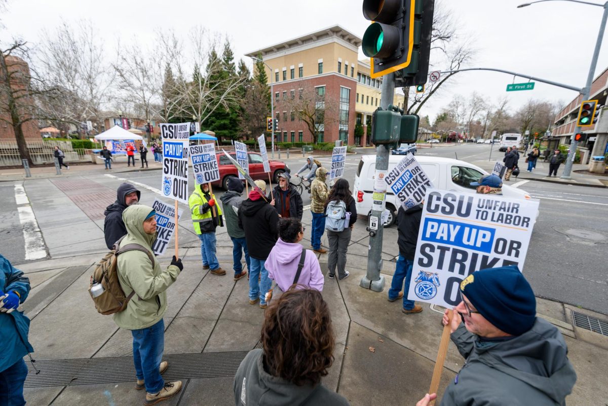 Members of the striking Teamsters Local 2010 union picket at 1st and Ivy st. on Tuesday, Feb. 17, 2026 in Chico, Calif.  The teamsters say the CSU system is exploiting a loophole in their contract to deny previously-promised raises.
(Dash Ferrero/The Orion)
