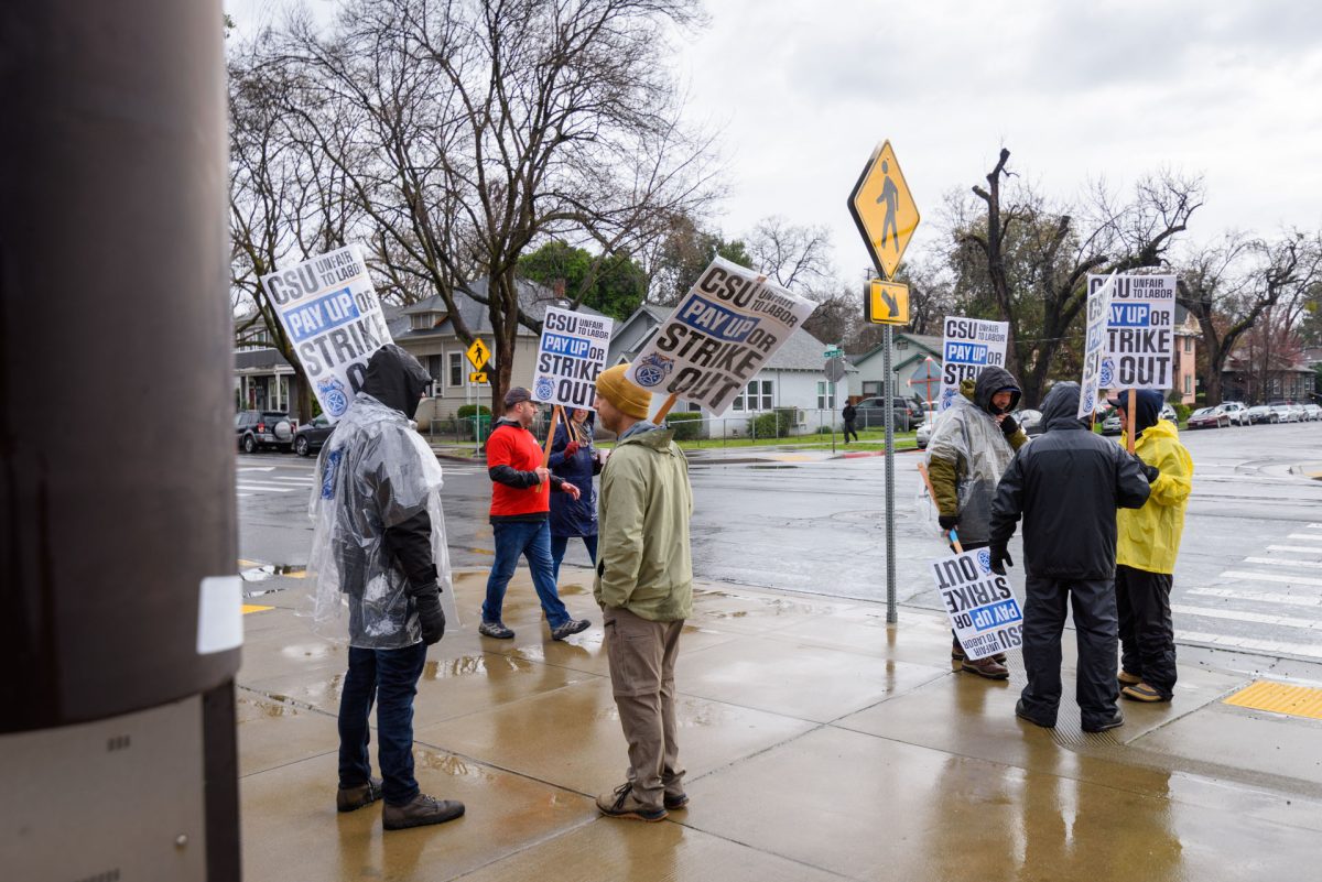 The snow was unexpected for the Teamsters, but in the early morning they stationed themselves under the parking garage outside of the WREC for cover. Photo taken by Dash Ferrero on Feb. 19, 2026.
