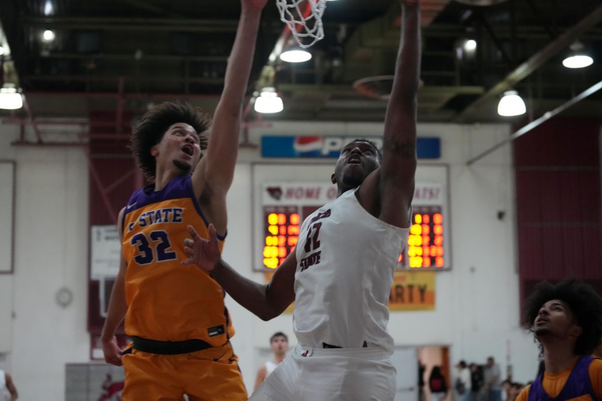 Isaiah Brewington sinking a basket from inside the paint. Photo taken by Aiyana Curry on February 13.