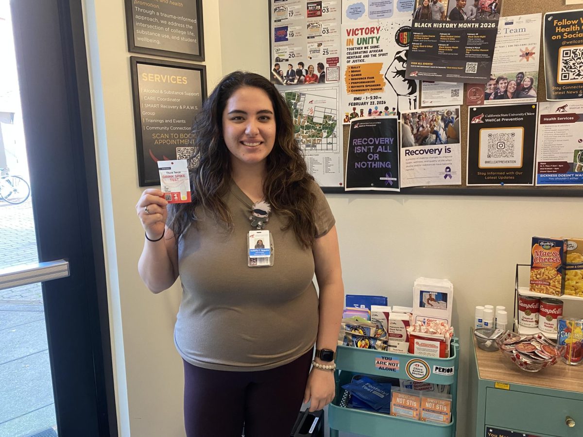 WellCat Prevention intern Isabella Requiro is presenting the drink spike test kits provided at WellCat Prevention Center at ESTM 150P. Photo taken by Lucy Bakowski, Feb. 26, 2026.