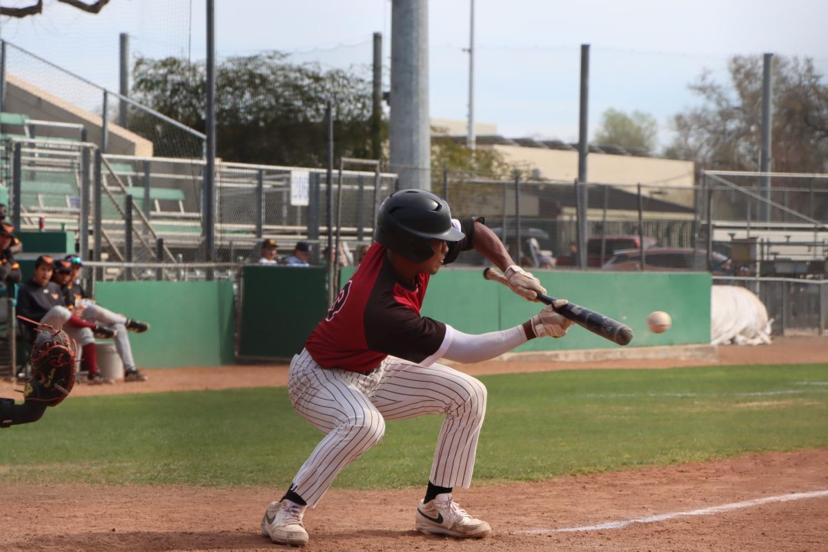 Junior Infielder Jaylen Hodges lays down a perfect bunt. Photo taken by Jamison Leung on March 7, 2026