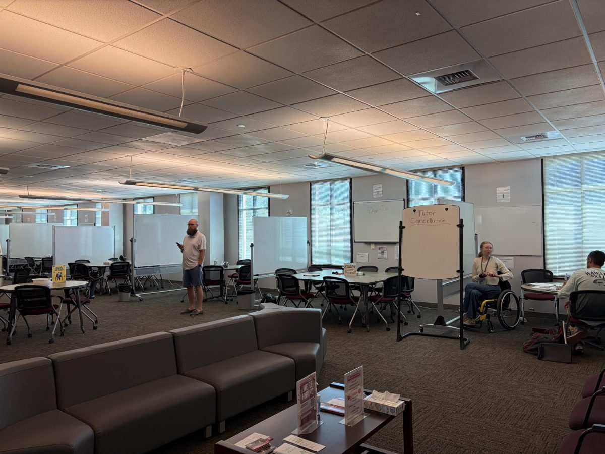 Students and tutors at the Student Learning Center work together in spaces divided by panels. The Student Learning Center can be found on the third floor of the Student Services Center in room 340. Photo taken by Lexi Lynn April 2, 2026.
