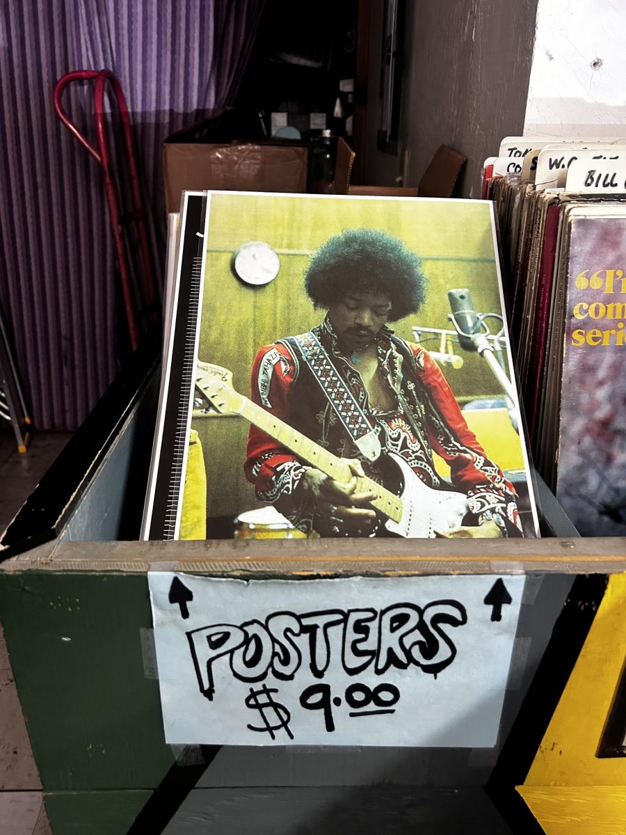 Posters of popular musicians are available and affordable at Melody Records. Photo taken by Bria Martinez April 17, 2026. 