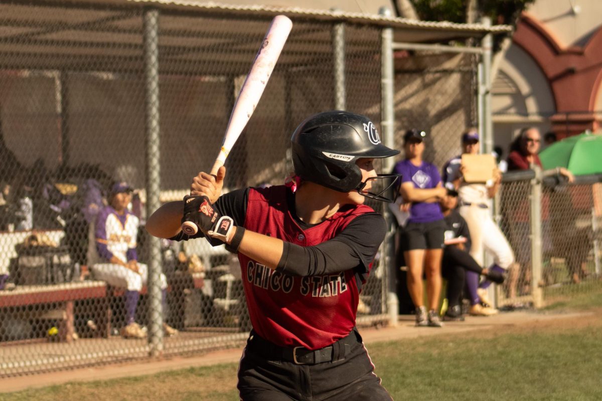 Senior catcher Brianna Swihart locking in to square up a pitch an get herself a base hit. Photo taken by Merri Shiger, on April 3, 2026.