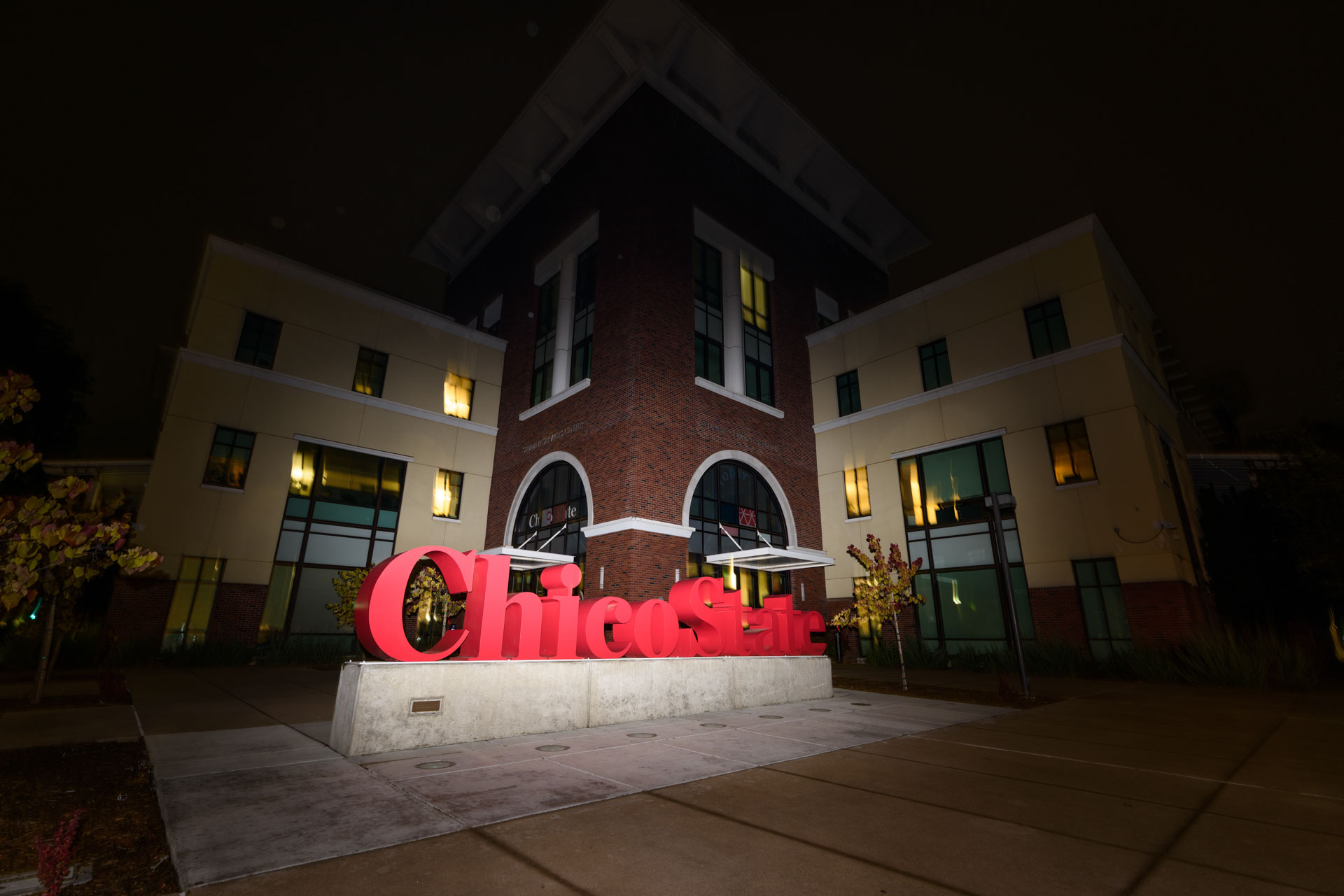 The Chico State sign in front of the Student Success Center sits darkened during an unexpected midnight power outage. 
Photo taken by Dash Ferrero on May 5, 2026 in Chico, California.