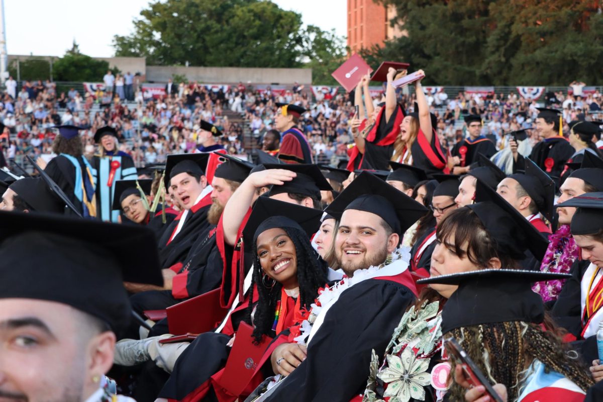 Journalism and Public Relations graduates find their friends in the crowd. Photo taken by Josephine Bowman May 14, 2026.